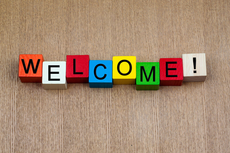 Welcome sign in colourful wooden blocks.